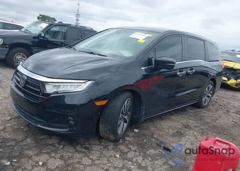 2021 Honda Odyssey Touring z USA, uszkodzony, nr VIN 5FNRL6H82MB028272